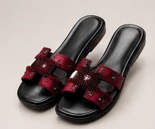 An upcoming NIKOZ silhouette in burgundy with an embellished strap