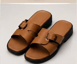An upcoming NIKOZ silhouette in tan leather with a buckle